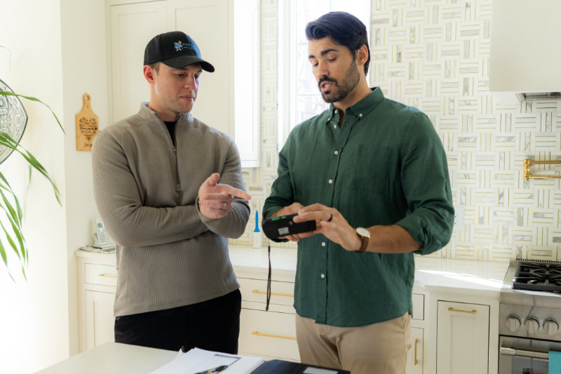 Chapman Stephens consulting with a homeowner about indoor air quality
